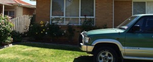 please tell me why the car is in the front yard please tell me why the car is in the front yard